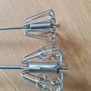 Pair of hand held push whisks