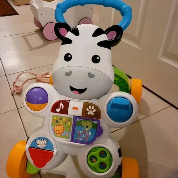 Fisher Price baby walker with sound and learning features