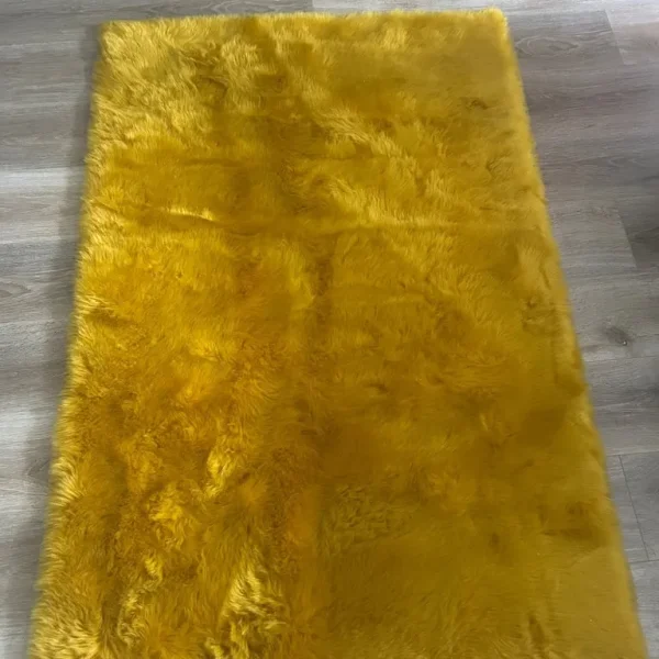 Yellow/ gold faux fur rug