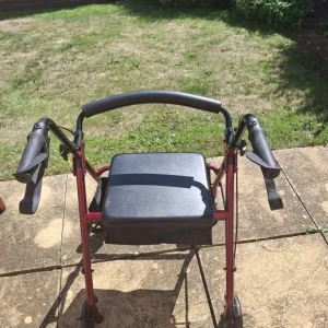 Mobility walker with seat and shopping compartment