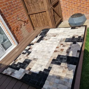 Living room large rug patchwork cow hide