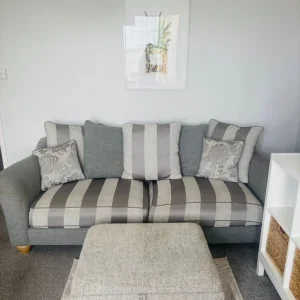 Oak Furnitureland 4 Seater Sofa and Footstool - Image 2