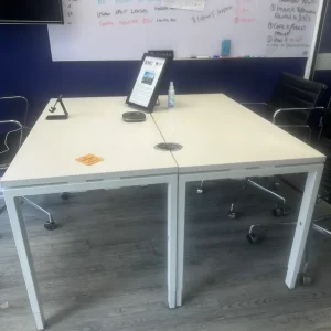 Chairs with wheels, tables, and extendable desk