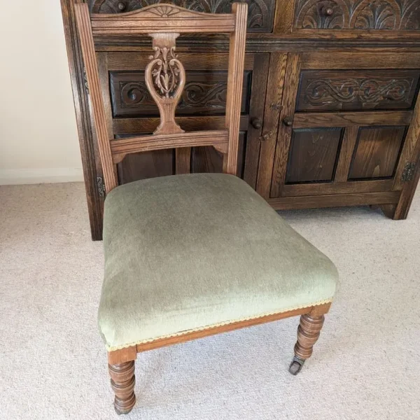 Small vintage wooden upholstered chair