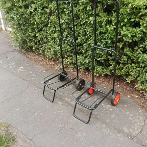 Two folding trolleys