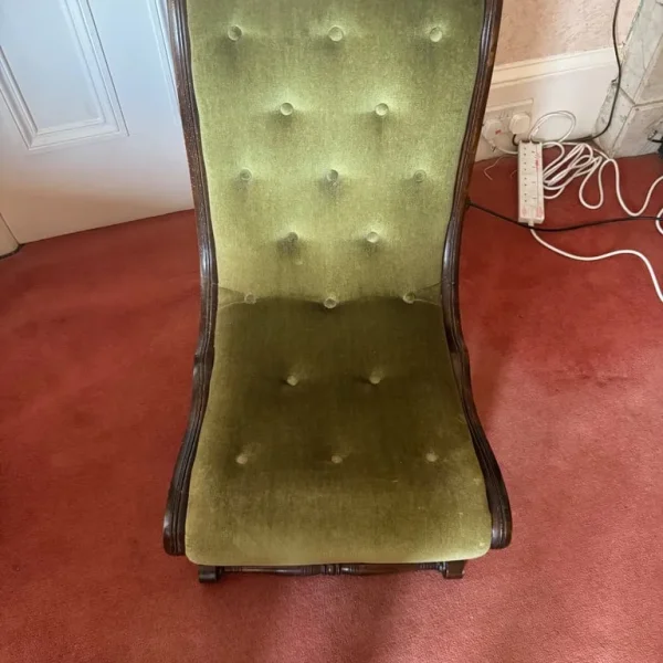 Antique green velvet chair
