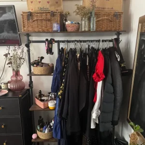 Wardrobe with shelves and clothes rack