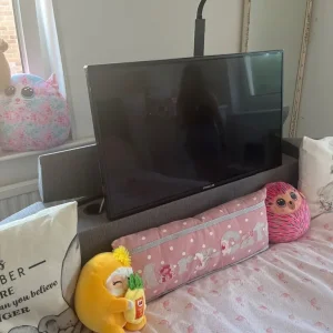 Grey double bed with built-in TV and storage - Image 5