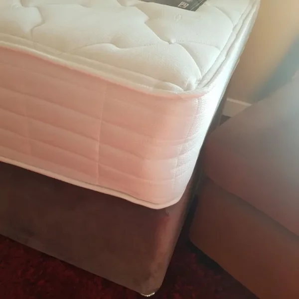 Hardly used single bed with headboard
