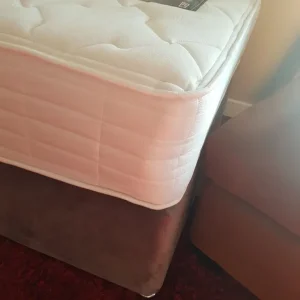 Hardly used single bed with headboard
