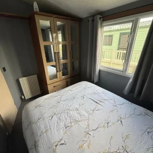 2010 Willerby Scenic 3-bedroom static caravan with hottub and wrap-around decking - Image 4