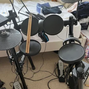 Yamaha Electric Drum Set with Fender Amp and Drumsticks - Image 2