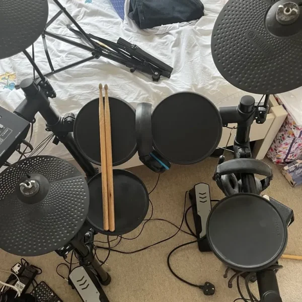 Yamaha Electric Drum Set with Fender Amp and Drumsticks
