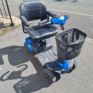 Mobility scooter with rear bag and charger