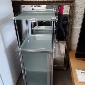 Frosted glass and chrome shelf unit with one glass door