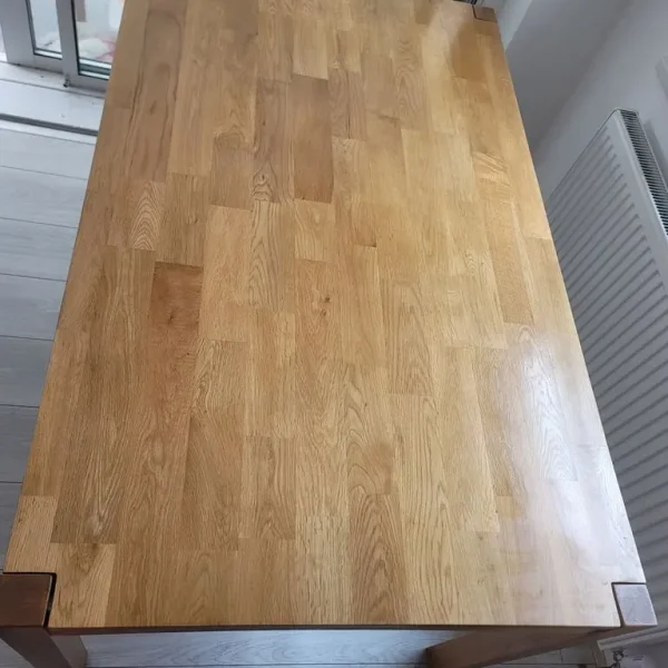 Woden dining table and 4 black chairs