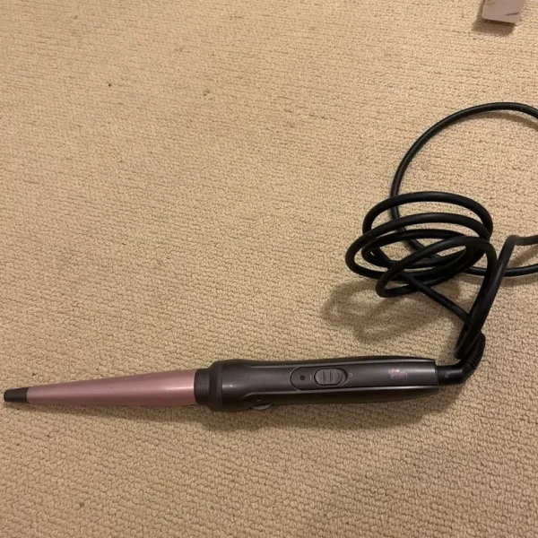 Phil Smith curling wand