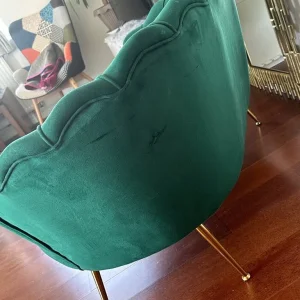 Dark green velvet sofa