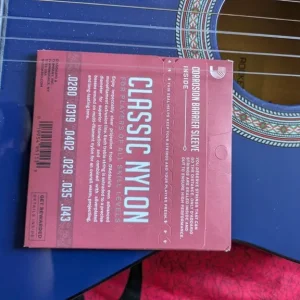 Blue full-size classical guitar with bag and strings - Image 7