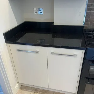 Full kitchen with granite worktops and integrated dishwasher - Image 2
