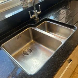Full kitchen with granite worktops and integrated dishwasher - Image 4
