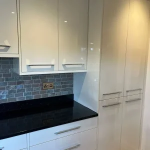 Full kitchen with granite worktops and integrated dishwasher - Image 7