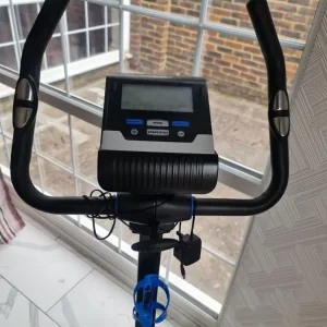 Roger Black on stand exercise bike