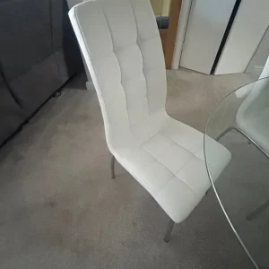 Glass oval table and 6 ivory faux leather chairs - Image 7