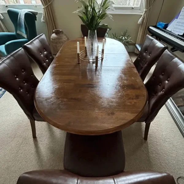 Solid wood extending dining table with 6 leather chairs