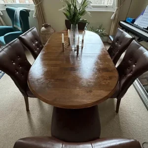 Solid wood extending dining table with 6 leather chairs
