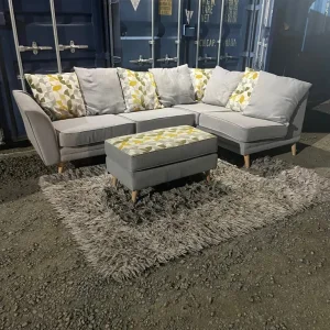 Light grey L shape corner sofa and pouffe