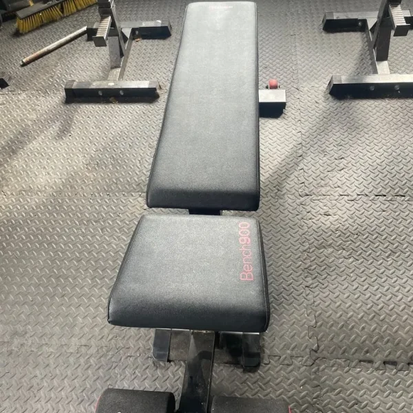 Gym bench, barbells, dumbbells and weights