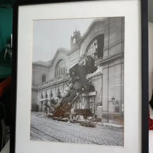 Framed black and white picture of The Montparnasse Train Wreck 1895