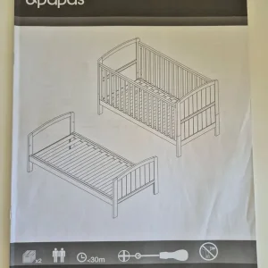 Wooden cotbed with mattress