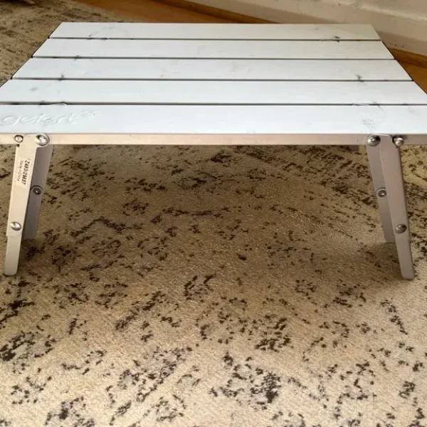 Compact camping table
