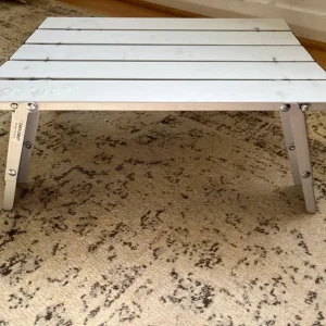 Compact camping table