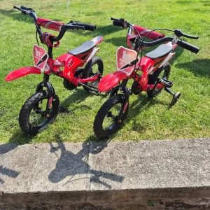Two kids bikes with stabilisers