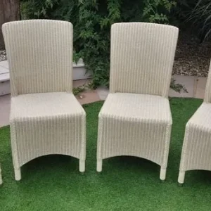 Four cream Vincent and Sheppard chairs