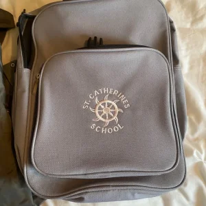 St Catherine’s school bag and rain coat - Image 2