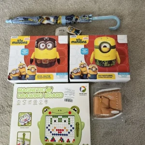2 x Minion inflatables, magnetic drawing board, and bay boots