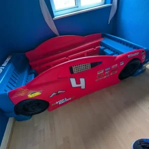 Red and blue childrens car bed
