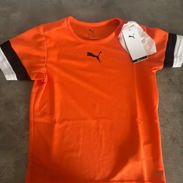 8 brand new Puma tops for ages 7-8
