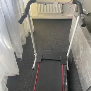 Old treadmill with spare parts