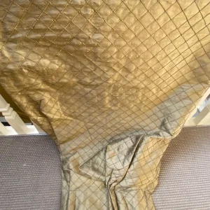 Silk organza curtains in vintage gold
