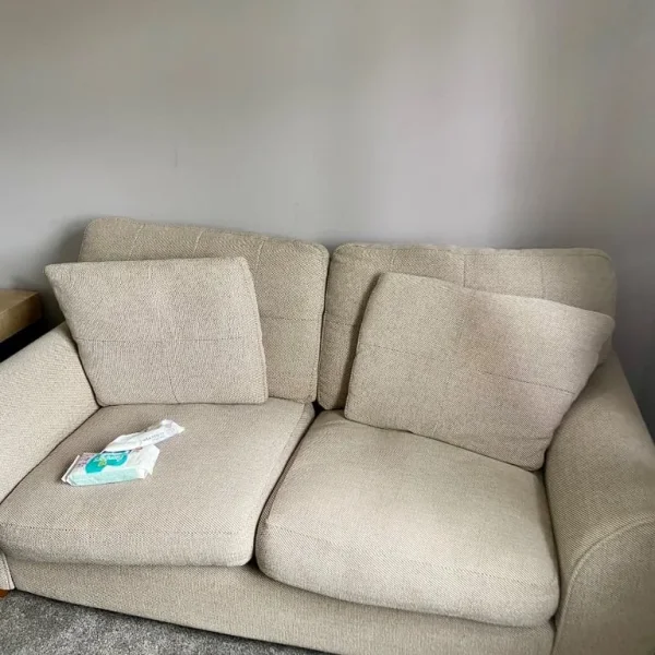 2-seater beige fabric sofa