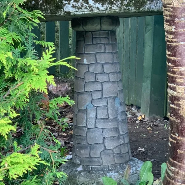Stone birdbath with sundial