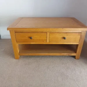 Coffee table with storage drawers and shelf