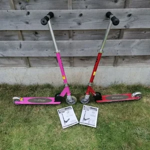JD Bug Jr childrens scooters - pink and red