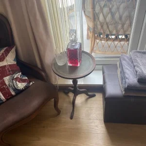 Decanter and table