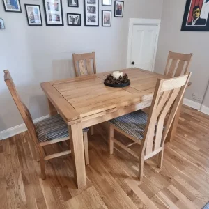 Solid oak table and 6 padded chairs